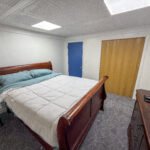 Bedroom with closet inside Unit 3 at The Flight Deck Residences.