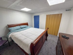 Bedroom with closet inside Unit 3 at The Flight Deck Residences.